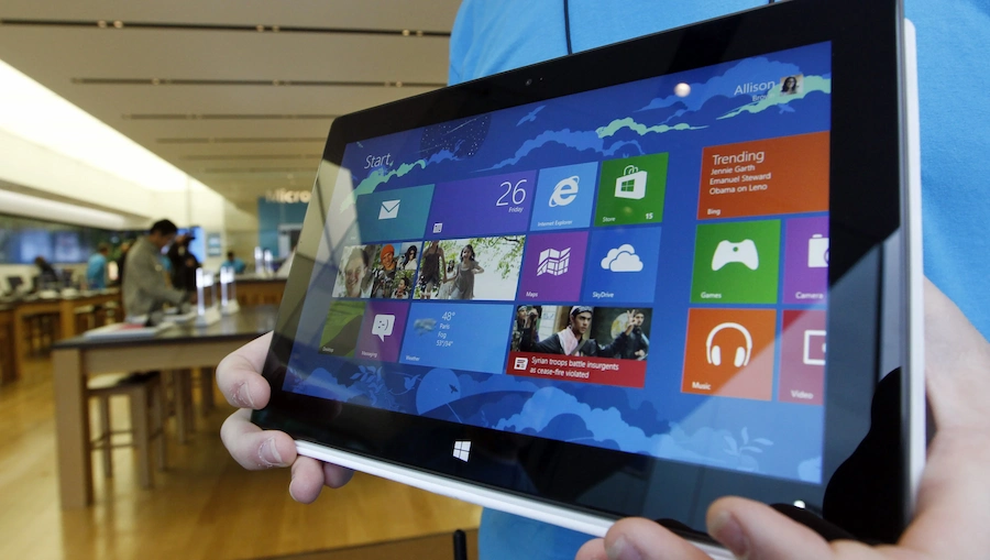 Windows 8 ra đời từ chính thất bại của Microsoft trước nhà Apple (ảnh: USA Today).